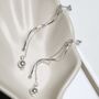 Sterling Silver Dancing Twist And Ball Stud Earrings, thumbnail 2 of 7