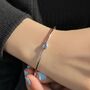 Minimalist Blue Topaz December Birthstone Silver Bangle, thumbnail 2 of 4