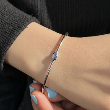 Minimalist Blue Topaz December Birthstone Silver Bangle, 2 of 4