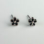 Sterling Silver Tiny Black Or White Flower Stud Earrings, thumbnail 3 of 9