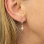 Sterling Silver Star Charm Sleeper Hoop Earrings, thumbnail 1 of 8
