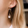 Gold Colour Delicate Bow Drop Earrings, thumbnail 2 of 3