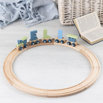 Engraved New Baby Polar Wooden Name Train, 8 of 12