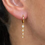 Orbit Crystal Huggie Hoop Earring Christmas Bauble, thumbnail 2 of 5