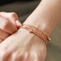 Heart Bead Triple Layered Bracelet In Rose Gold Plating, thumbnail 1 of 4