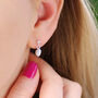 Sterling Silver Mini Cowrie Shell Drop Stud Earrings, thumbnail 1 of 6
