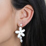 White Enamel Daisy Drop Earrings In Gold Plating, thumbnail 1 of 6