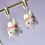 Pink Ceramic Cat Huggie Hoops Earrings, thumbnail 4 of 6