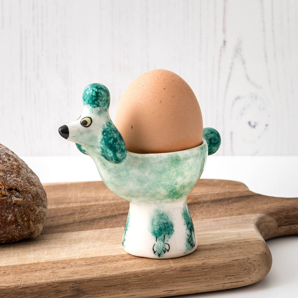 handmade ceramic poodle dog egg cup by hannah turner