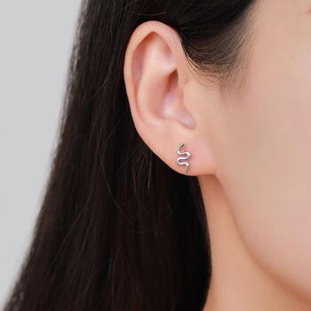 Mismatched Snake And Sword Stud Earrings In Sterling Silver, 2 of 11