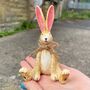 Little Rabbit Sitting Ornament With Twine Bow, thumbnail 1 of 4