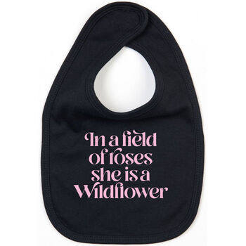 In A Field Of Roses She Is A Wildflower Slogan Baby Bib, 2 of 2