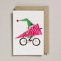 Risograph Christmas Card Elf On Bike, thumbnail 1 of 6