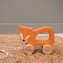 Personalised Wooden Pull Along Fox, thumbnail 1 of 2