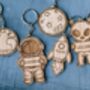 Personalised Space Themed Wooden Keyring | Astronaut, Rocket, Moon And Ufo Name Charm, thumbnail 1 of 9
