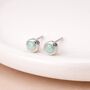 Sterling Silver White Opal Micro Stud Earrings – 4mm, thumbnail 1 of 12