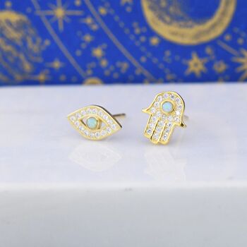 Mismatched Hamsa Hand And Evil Eye Cz Stud Earrings In Sterling Silver With Blue Opal, 3 of 12