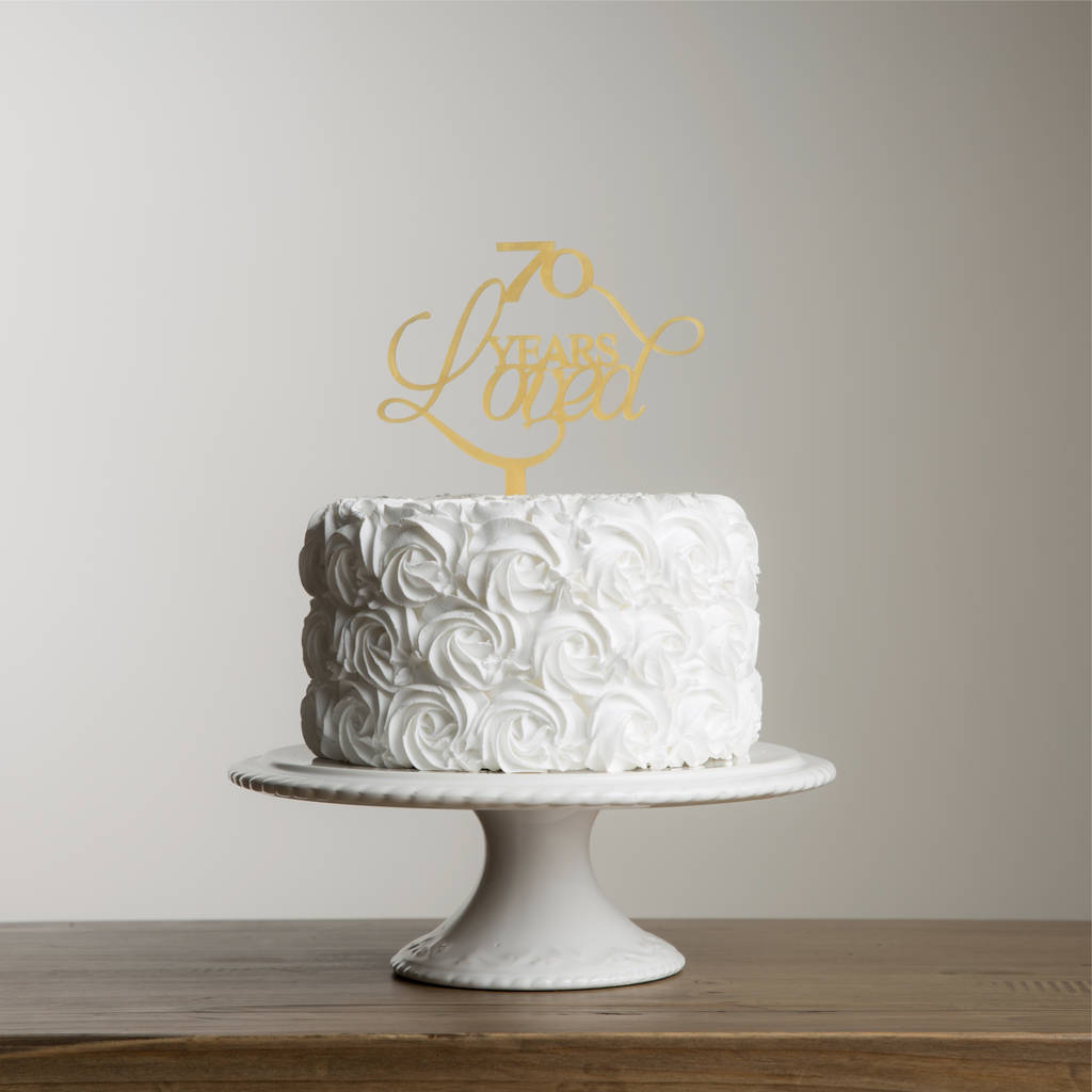 70 years loved cake topper set by funky laser | notonthehighstreet.com