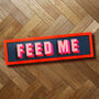 'Feed Me' Pink And Blue Funny Framed Landscape Print, thumbnail 2 of 6
