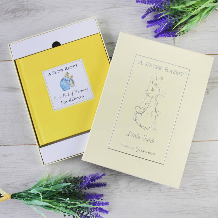 a collection of three personalised peter rabbit books by letteroom ...