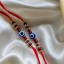 Red Sandalwood Evil Eye Zircon Rakhi For Raksha Bandha, thumbnail 3 of 5