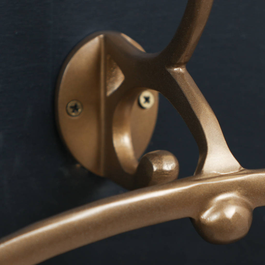 Gold Wall Mounted Clothes Rail By Dibor