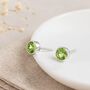 Sterling Silver Peridot Birthstone Stud Earrings, thumbnail 1 of 7