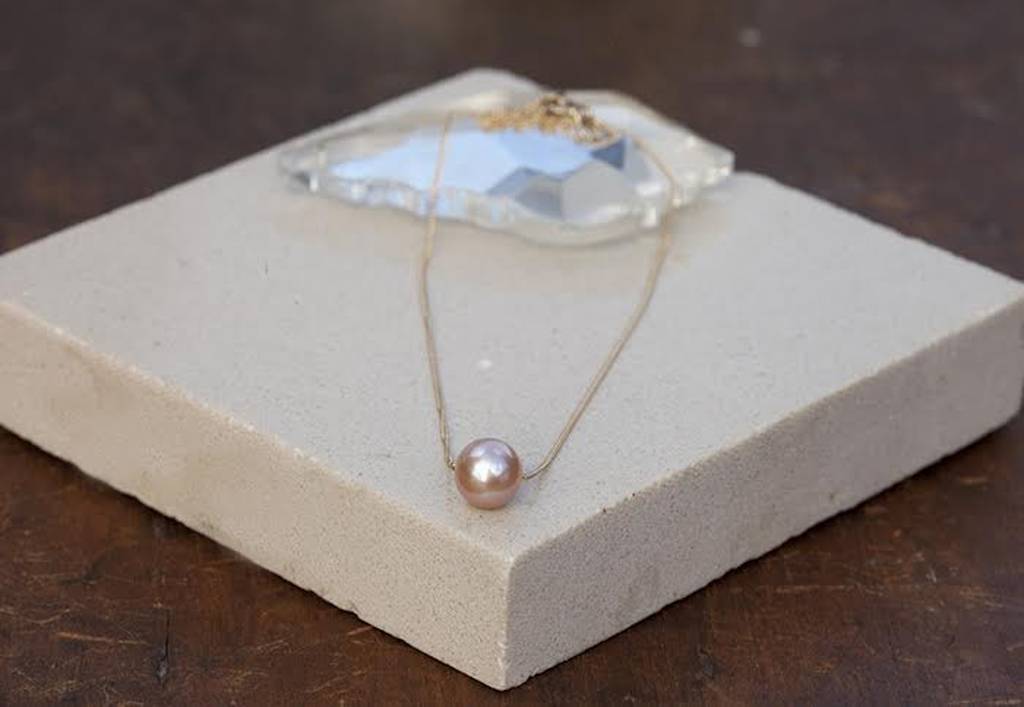 gold floating pearl necklace by joulberry