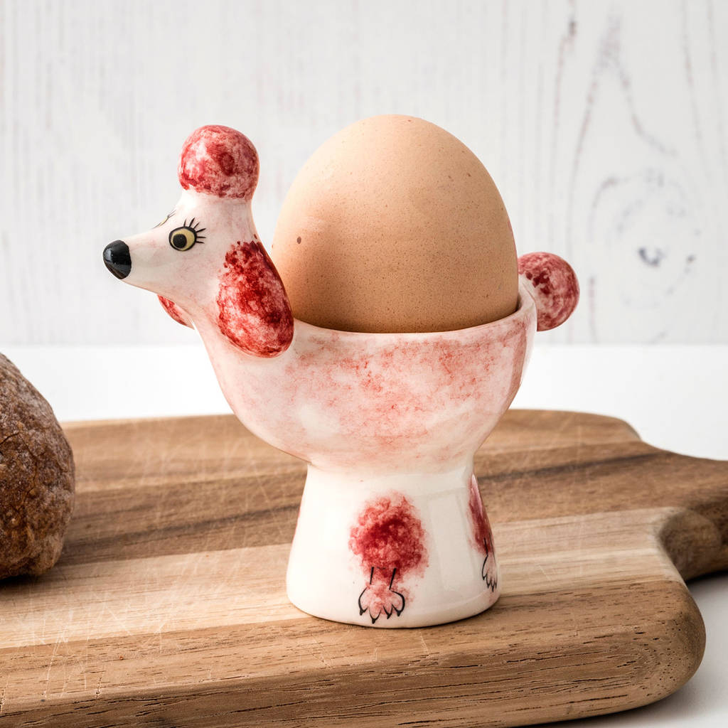 handmade ceramic poodle dog egg cup by hannah turner