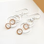 Silver And Rose Gold Swinging Circles Dangly Earrings, thumbnail 2 of 4