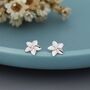 Sterling Silver Tiny Plumeria Flower Stud Earrings, thumbnail 1 of 12