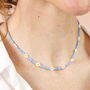 Stainless Steel Blue Beaded Flower Charm Necklace In Gold Plating, thumbnail 2 of 5