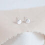 Tiny Sterling Silver Disc Stud Earrings, thumbnail 1 of 10