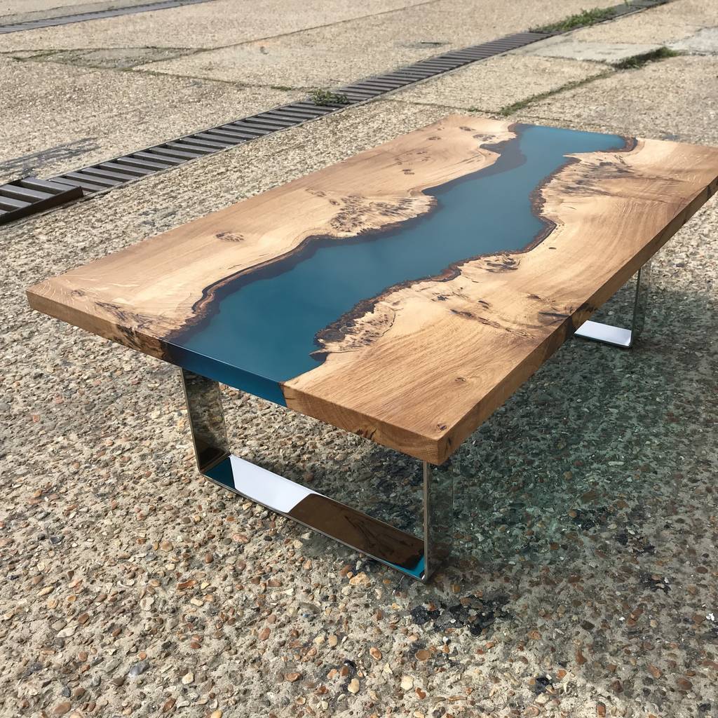 resin river coffee table with chrome legs by revive