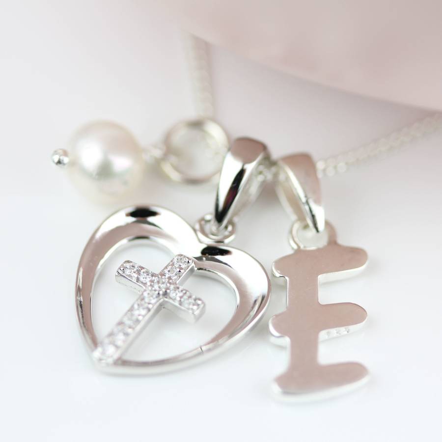 personalised child's silver christening cross pendant by nest