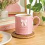 A Wonderful Daughter Embossed Bow Mug, thumbnail 1 of 2
