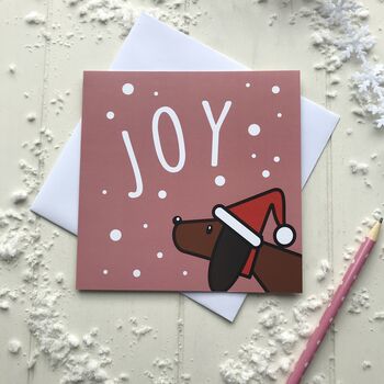 A Set Of Four Modern Dog Themed Christmas Cards, 3 of 5
