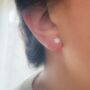 Petite Flower Shaped Pearl Earrings, thumbnail 2 of 3
