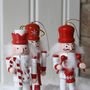 Set Of Five Red Nutcracker Ornaments, thumbnail 2 of 3