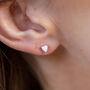 Tiny Sterling Silver White Opal Heart Stud Earrings, thumbnail 1 of 4