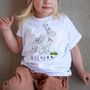 Personalised Kids Easter T Shirt – Cute Bunny And Flower Design, thumbnail 1 of 3