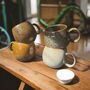 Set Of Four Reactive Glaze Mugs In Earth Tones, thumbnail 4 of 5