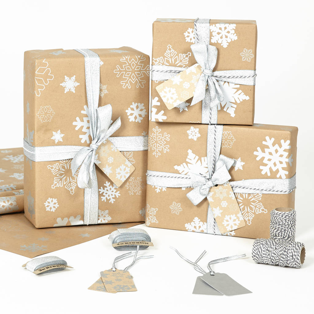 snowflakes brown christmas wrapping paper by sophia victoria joy | notonthehighstreet.com