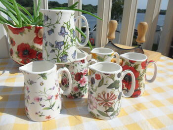 Set Of Six Cream Jugs In Assorted Floral Designs, 9 of 10