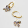 Gold Forget Me Not Bow Huggie Earrings, thumbnail 4 of 9
