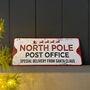 Metal 'North Pole Post Office' Christmas Sign, thumbnail 1 of 3