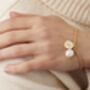 Gold Initial Disc Bracelet With Freshwater Pearl, thumbnail 8 of 9