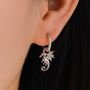 Sterling Silver Flying Dragon Huggie Hoop Earrings, thumbnail 1 of 11