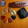 Acoustic Guitar Merry Christmas Tin Of Eight Picks, thumbnail 1 of 10