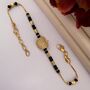 18k Gold Plated Black Bead Nazar Charm Bracelet, thumbnail 3 of 5